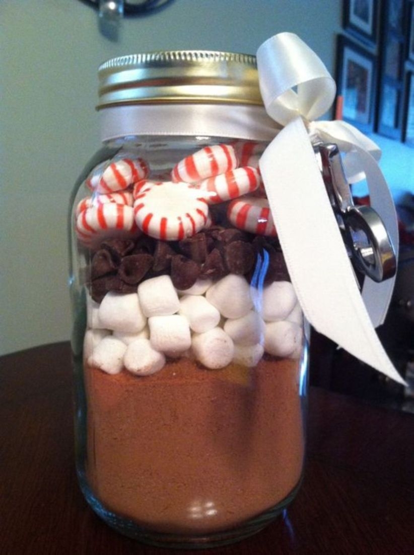 Christmas coca diy gift cups of hot chocolate mix in the bottom .