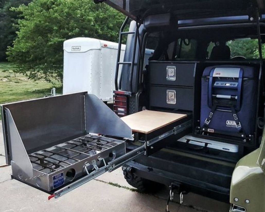 Man's compact camping kitchen system means better off-road cooking