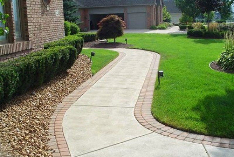 oncrete walkway with brick edging