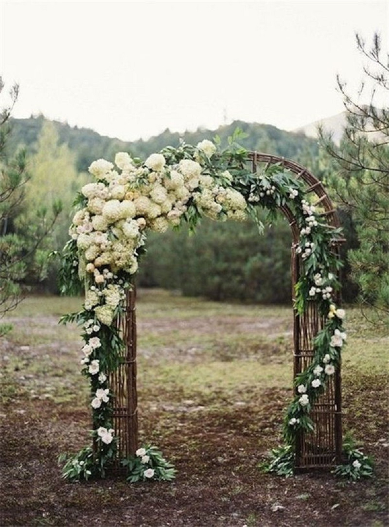 Outdoor wedding ceremony flower wedding arch