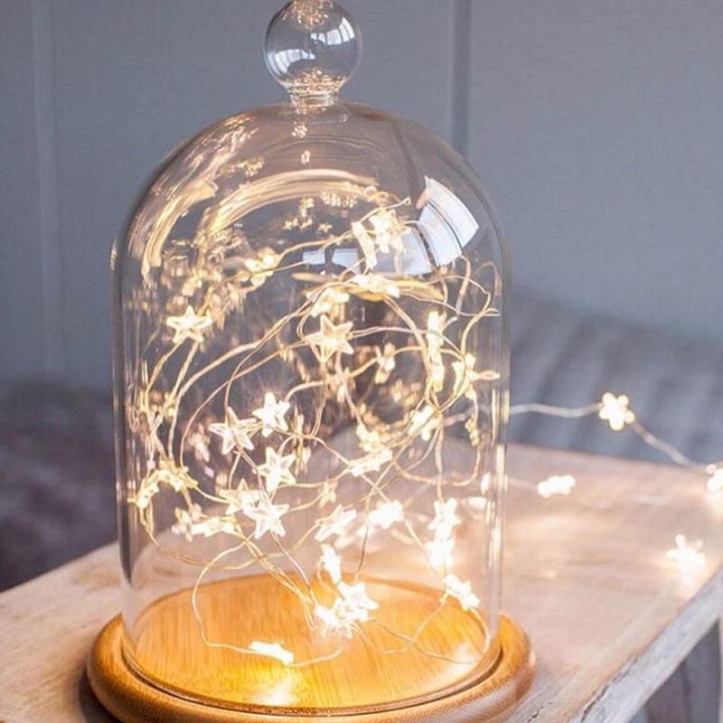 glass cloche with stars lights