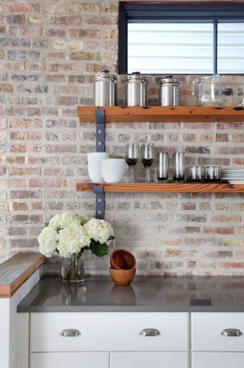 Whitewashed red brick backsplash