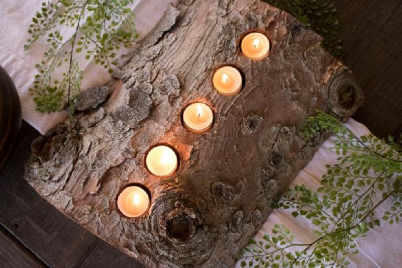 Rustic centerpiece with tea light from a wooden log 4