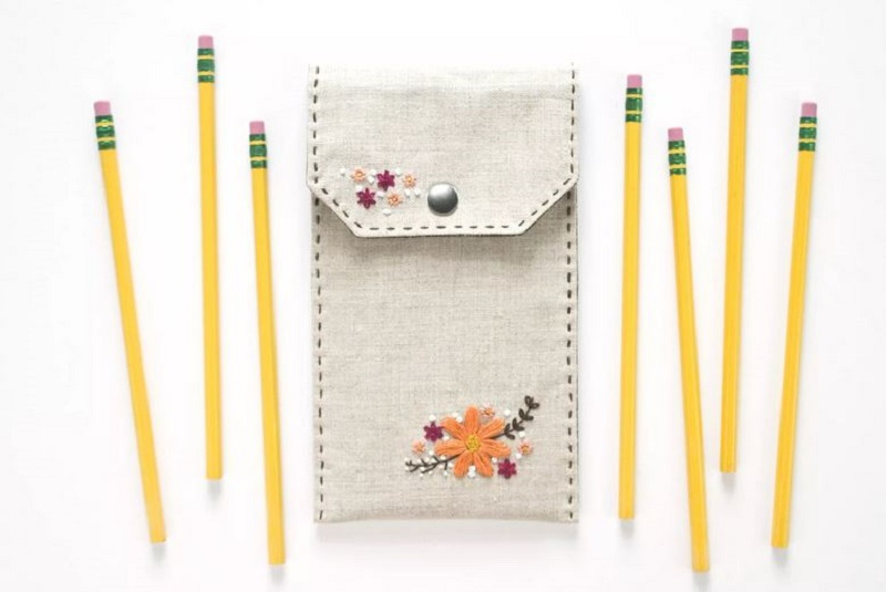 Embroidered flower on a pencil case