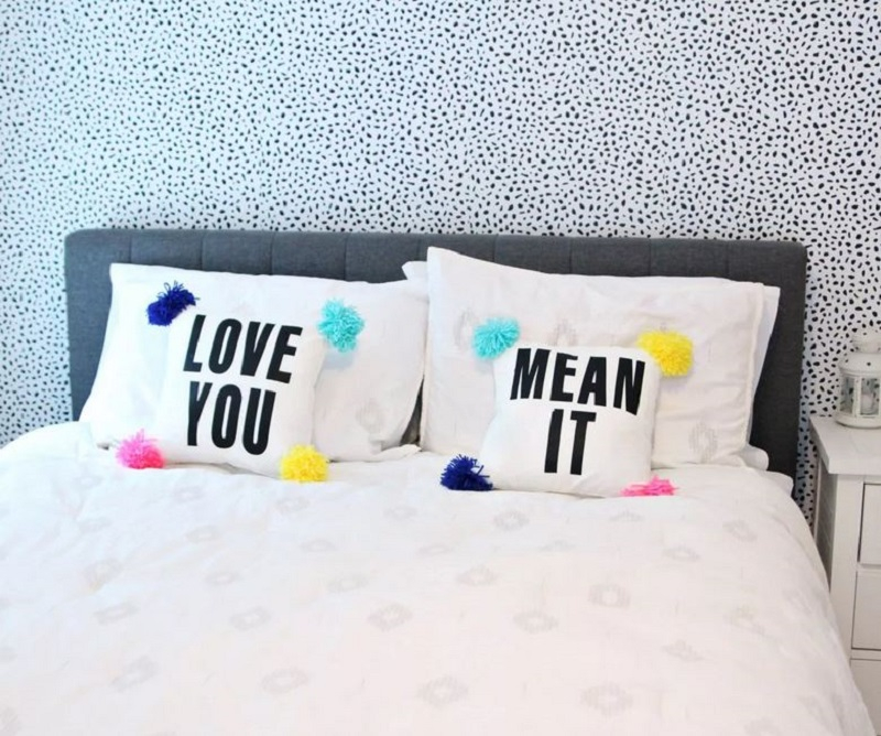 Pillow with pom poms