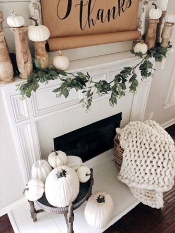 Neutral rustic fall decor with a sign