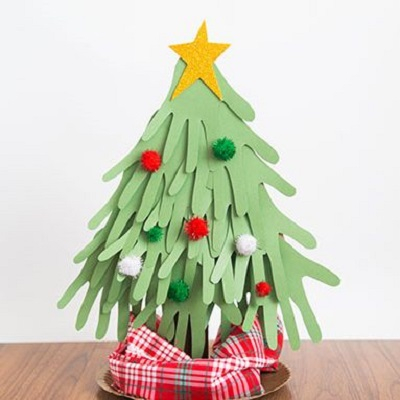 Handprint christmas tree Delightful Christmas Handprint Crafts That Anyone Will Keep Forever