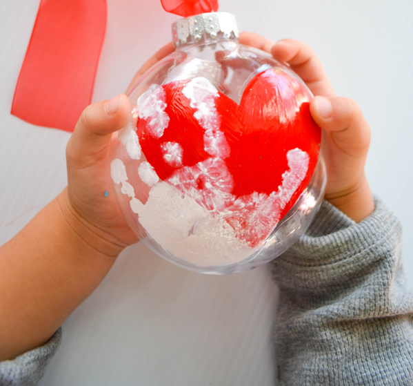 Handprint keepsake ornament Delightful Christmas Handprint Crafts That Anyone Will Keep Forever