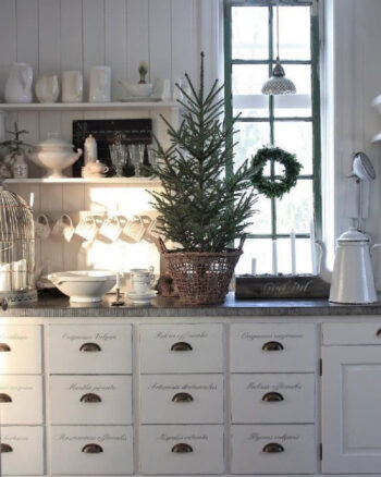 Mini christmas tree in nordic country kitchen