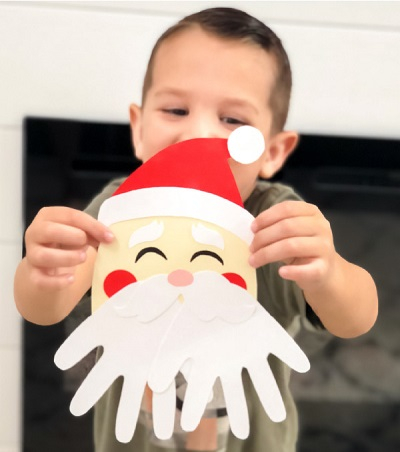 Simple santa handprint craft Delightful Christmas Handprint Crafts That Anyone Will Keep Forever