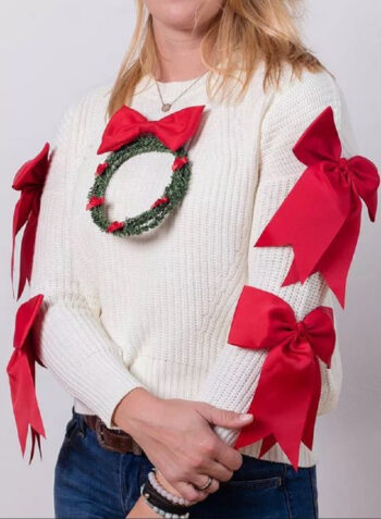 White sweater with red bow