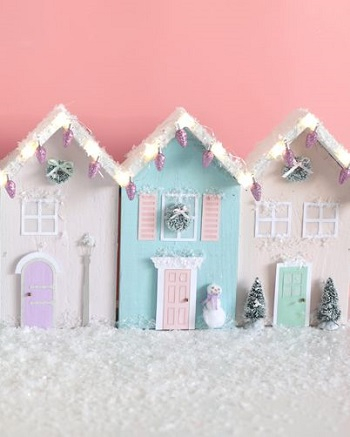 Wooden christmas row houses with lights DIY Charming Rustic Christmas Wood Projects For Your Amazing Home