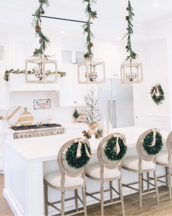 Wreaths on the back of kitchen bar chairs