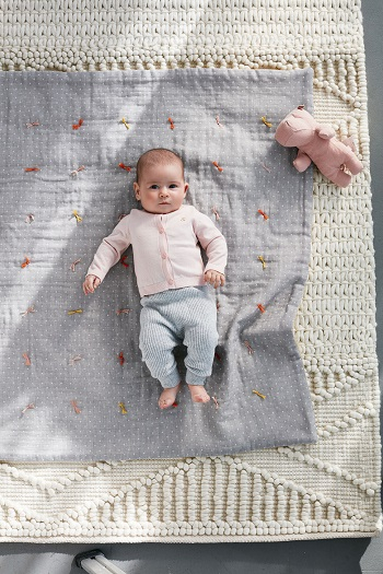 Baby quilt with knots Keep Your Days Warm And Cozy With Incredible Winter Sewing Projects