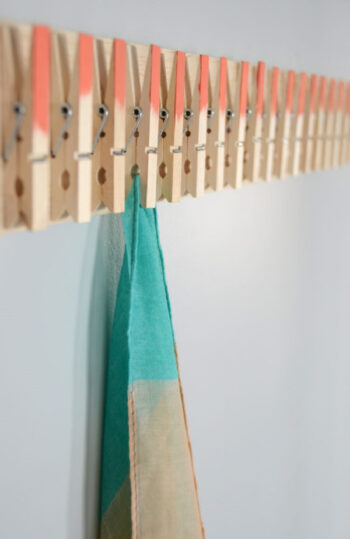 Diy cool clothespin scarf hanger