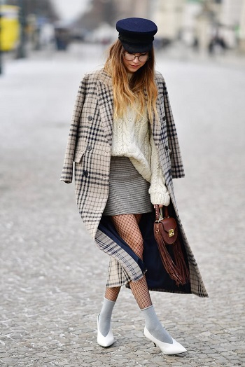 Top your tights with socks Winter Fashion Hacks To Stay Warm While Still Perfectly Stylish