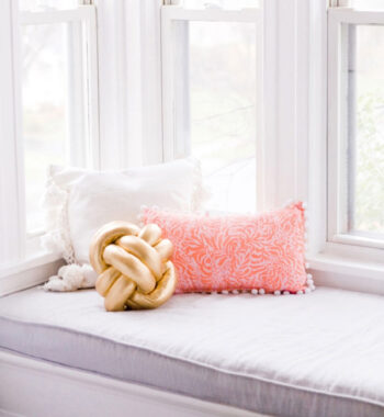 Gold spandex knot pillow