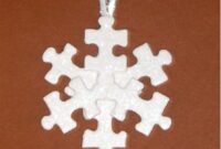 Diy snowflakes from upcycled puzzle