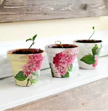 Decoupaged terracota pots Cheap And Cheerful DIY Pot Ideas For Your Planter