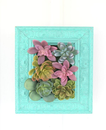 Succulent peaking around an old frame Decorating Ways To Display Rustic Frames For Your Farmhouse Home