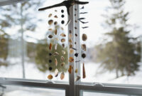 Beautiful seashell mobile in a window